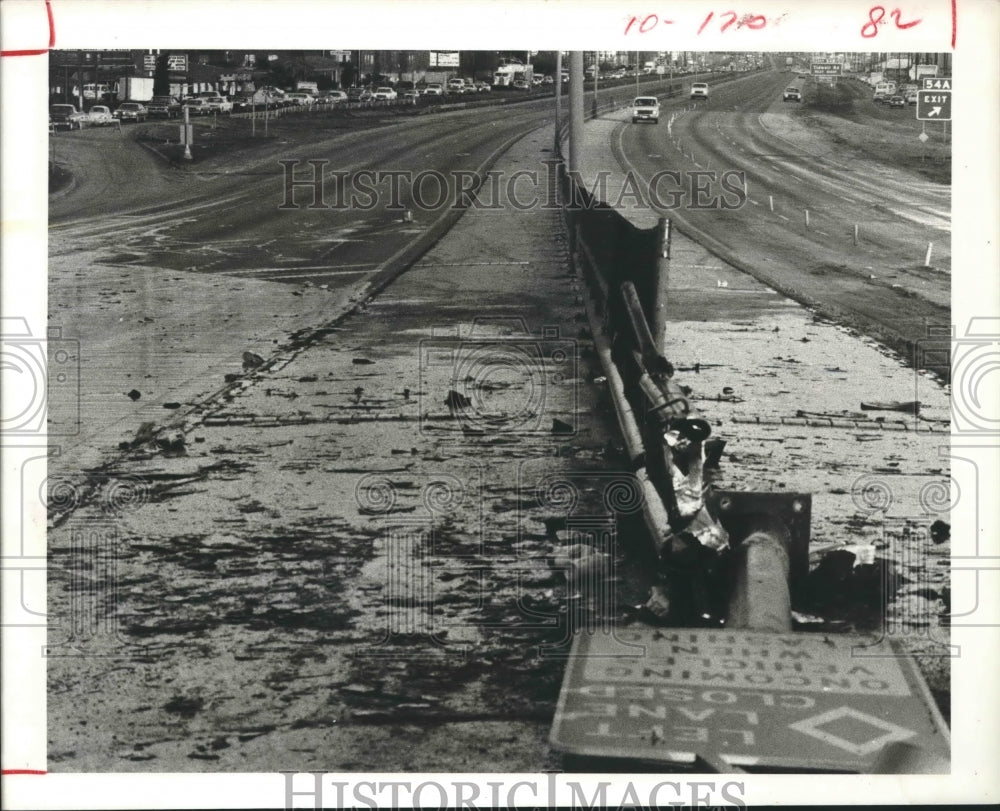 1981 Truck Overturns On Houston Freeway Leaving Oil On the Pavement. - Historic Images