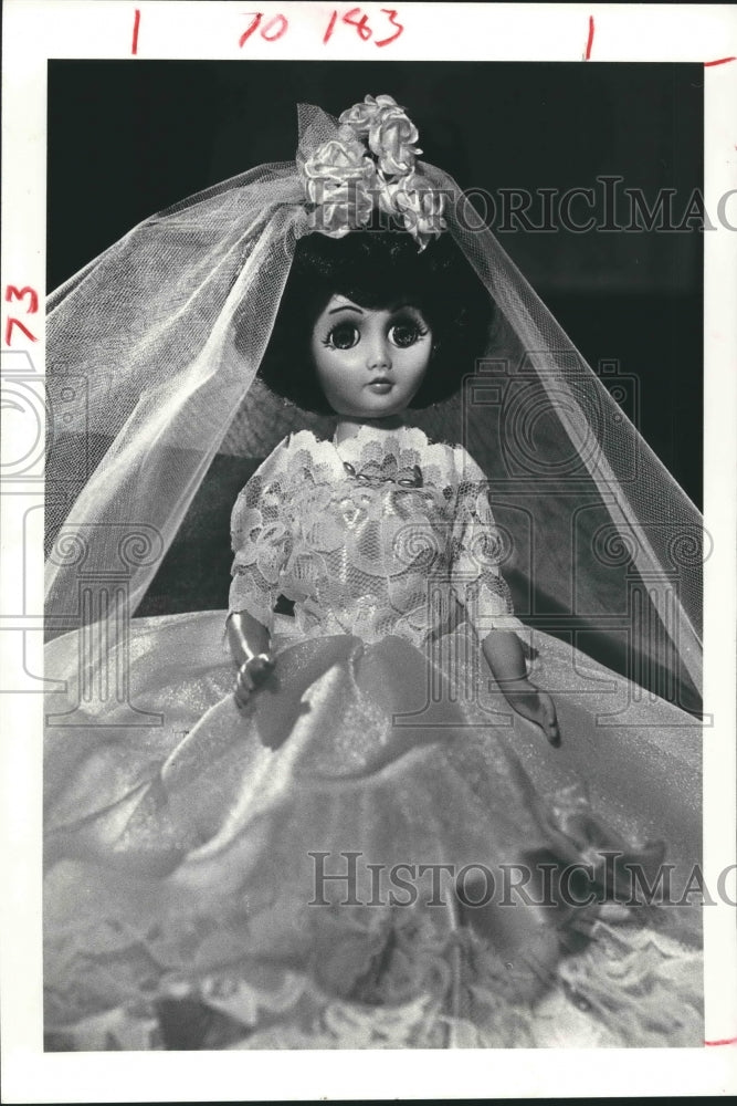 1983 Press Photo Rachel Rodriguez&#39;s Tattered Doll in Bridal Gown. - hca20216 - Historic Images