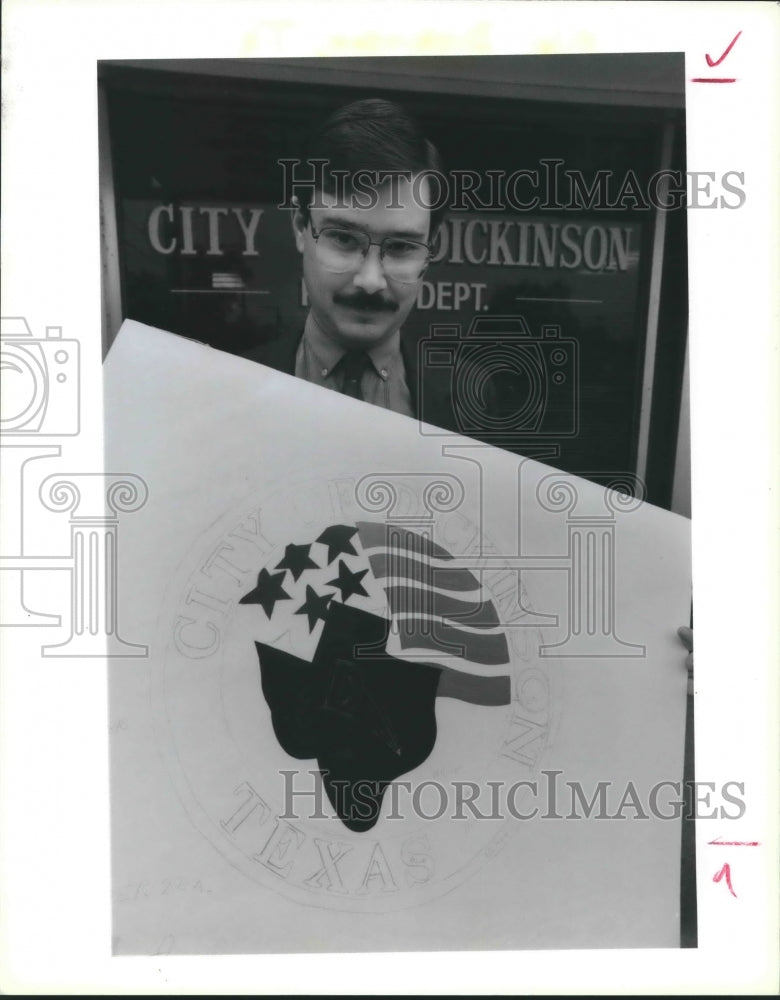 1988 Press Photo Wayne Broussard Dickinson Police HoldingNew City Seal, Texas. - Historic Images