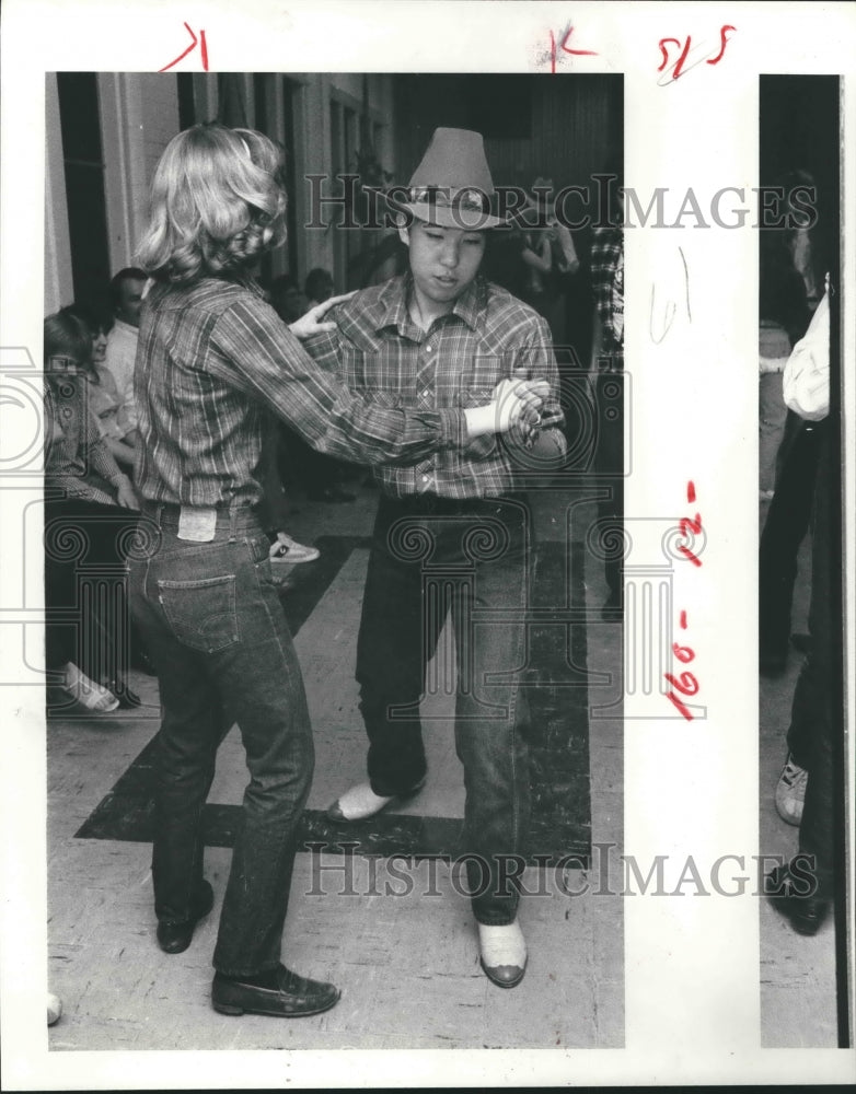 1981 Tet Fujimoto dances with Susan Cohen - Historic Images