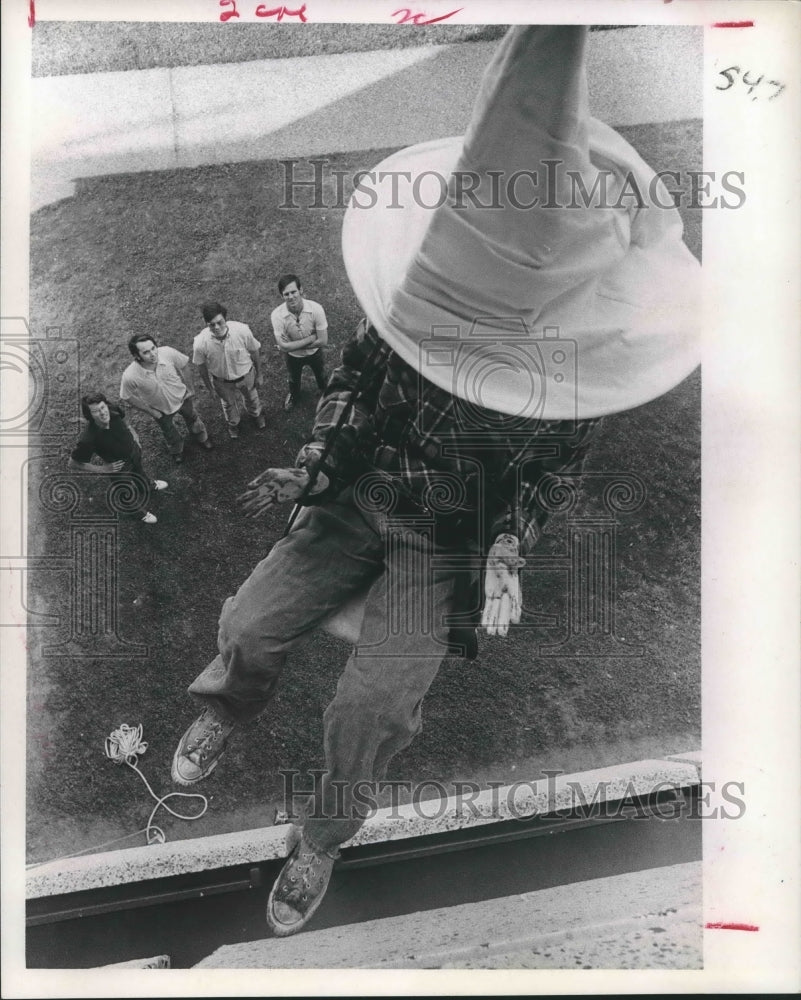 1974 Press Photo Dummy lowered in experimental fire escape - hca20722 - Historic Images