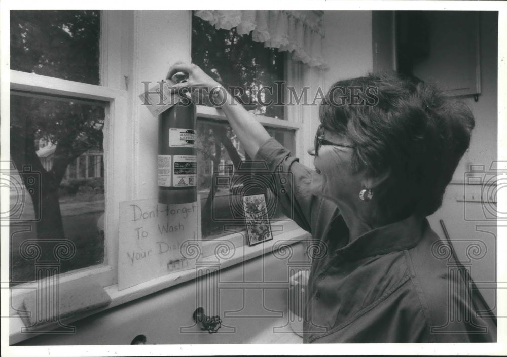 1984 Day Care Center Inspector Of Houston Checking Extinguisher Date - Historic Images