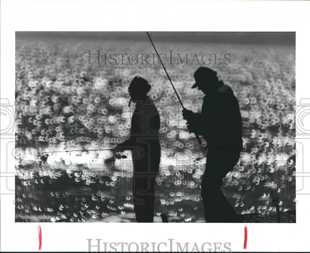 1987 Lee Dockal and Lee Colura fishing at Seawall in Galveston - TX - Historic Images