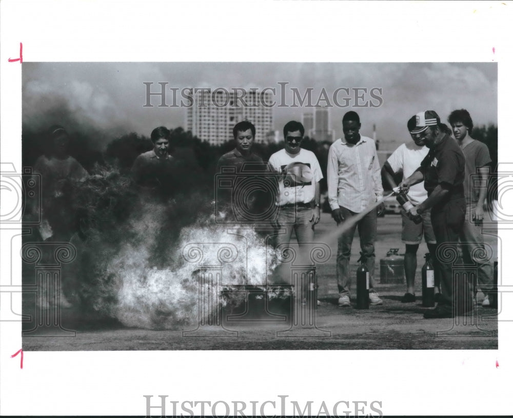 1991 George Reiser & Extinguisher, Rice Fire Safety Training Class. - Historic Images
