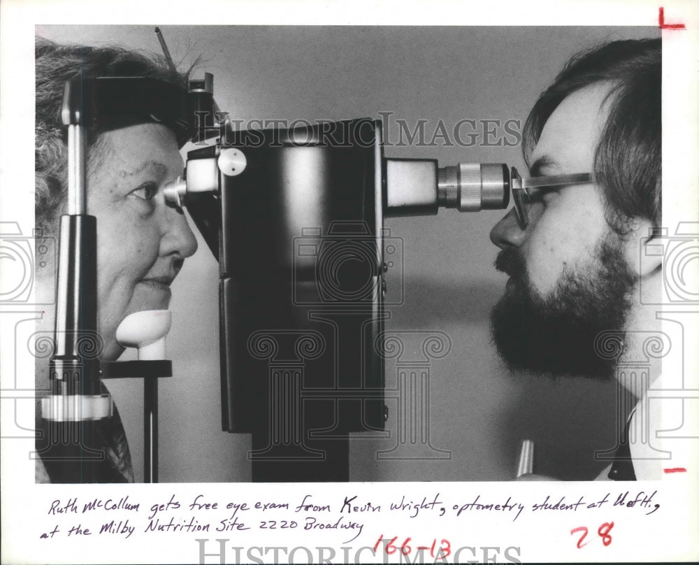 1982 Ruth McCollum gets eye test by Kevin Wright UH student - Historic Images