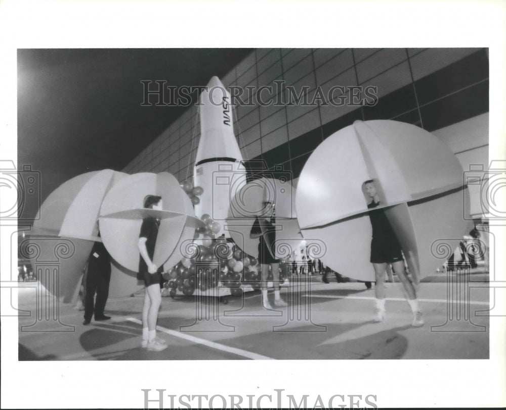 1987 Members of NASA parade float, Brown Convention Center, Houston - Historic Images