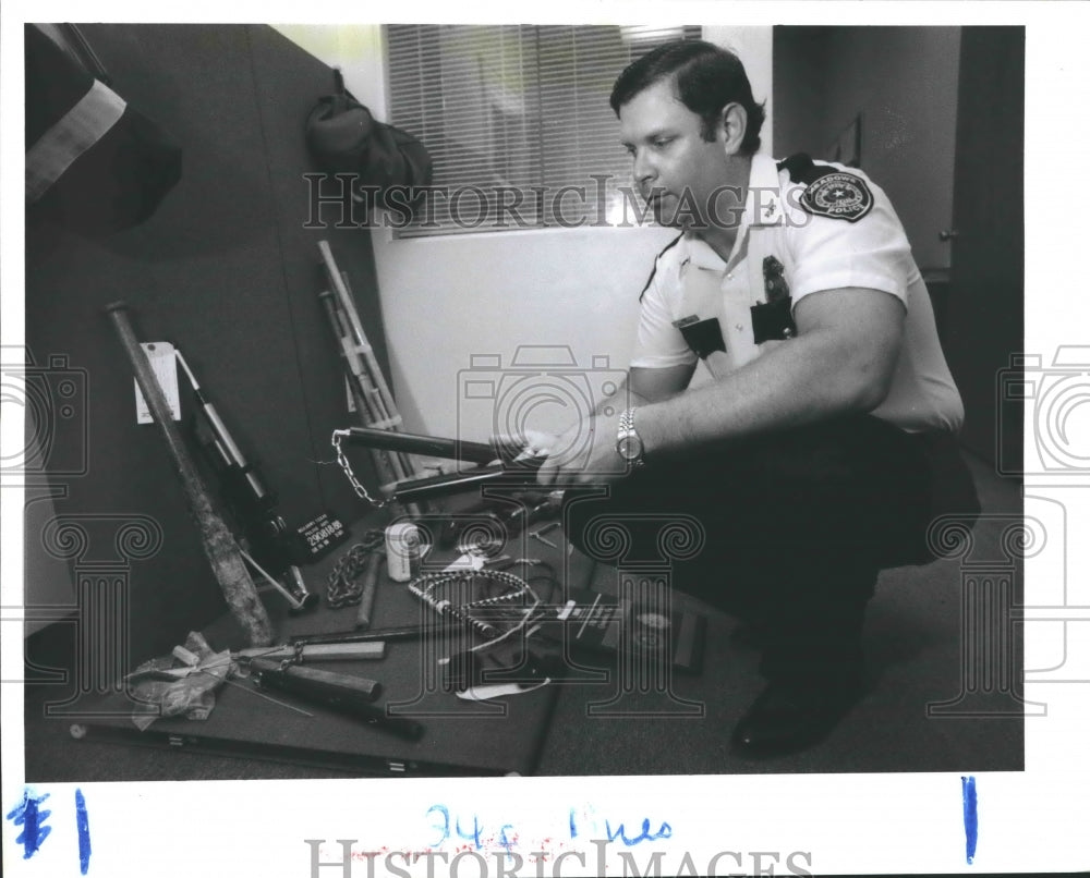 1988 Meadows Police Chief with confiscated Oriental weapons, Houston - Historic Images