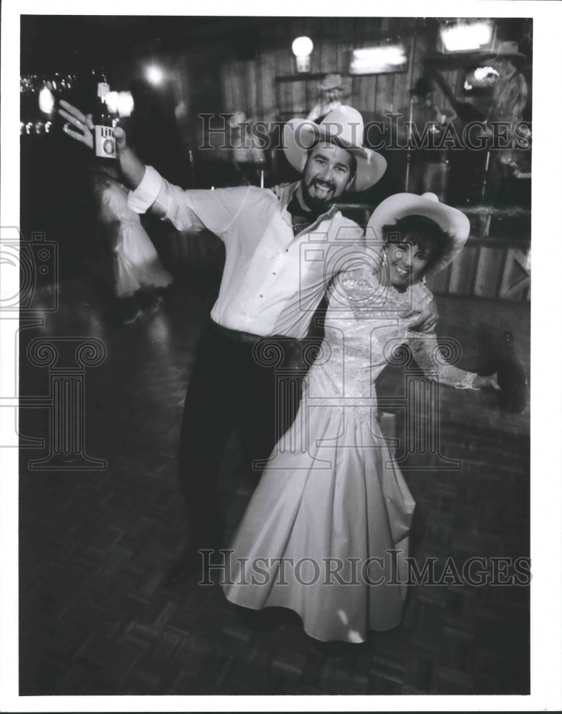 1988 Newlyweds dance at Eddie's Country Ballroom, Manuel, Texas - Historic Images