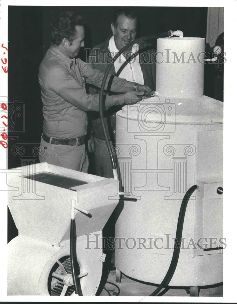 1982 Bill Griffith and John Boulton with gasohol refinery - Historic Images