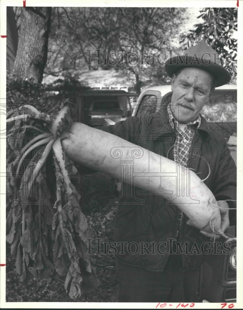 1981 Paul Key with his 12-pound radish in Houston, Texas - Historic Images