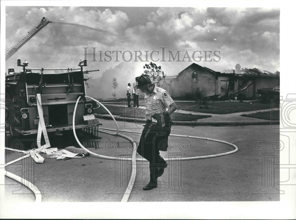 1982 Fireman fighting fires - Texas - Historic Images