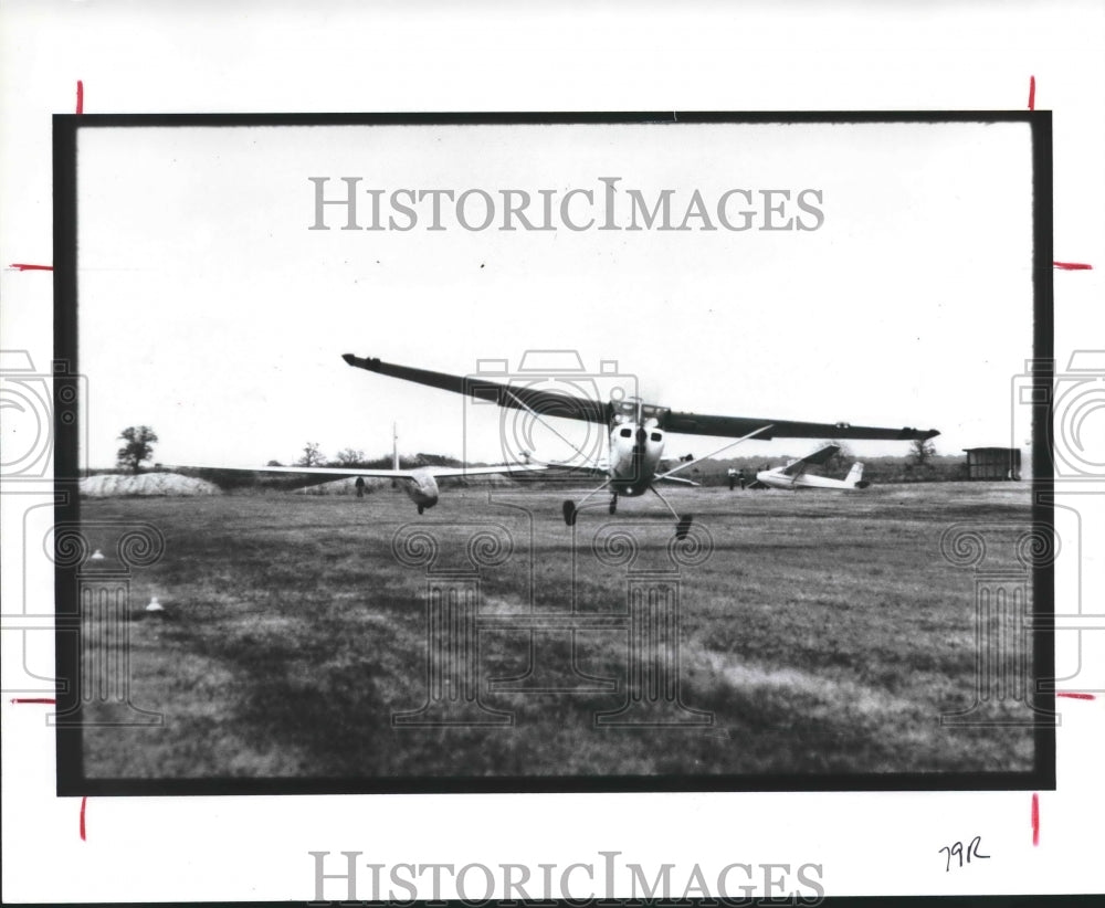 1987 Glider and tow plane taking off in Texas - Historic Images