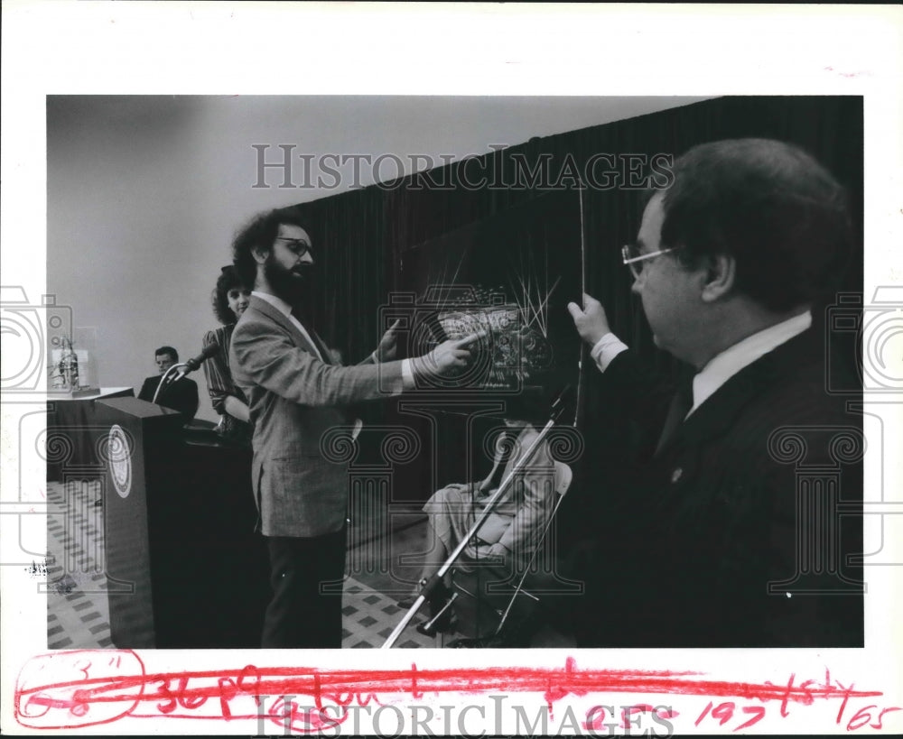 1987 Pyrotechnician Valerio Festi shows fireworks display, Houston - Historic Images