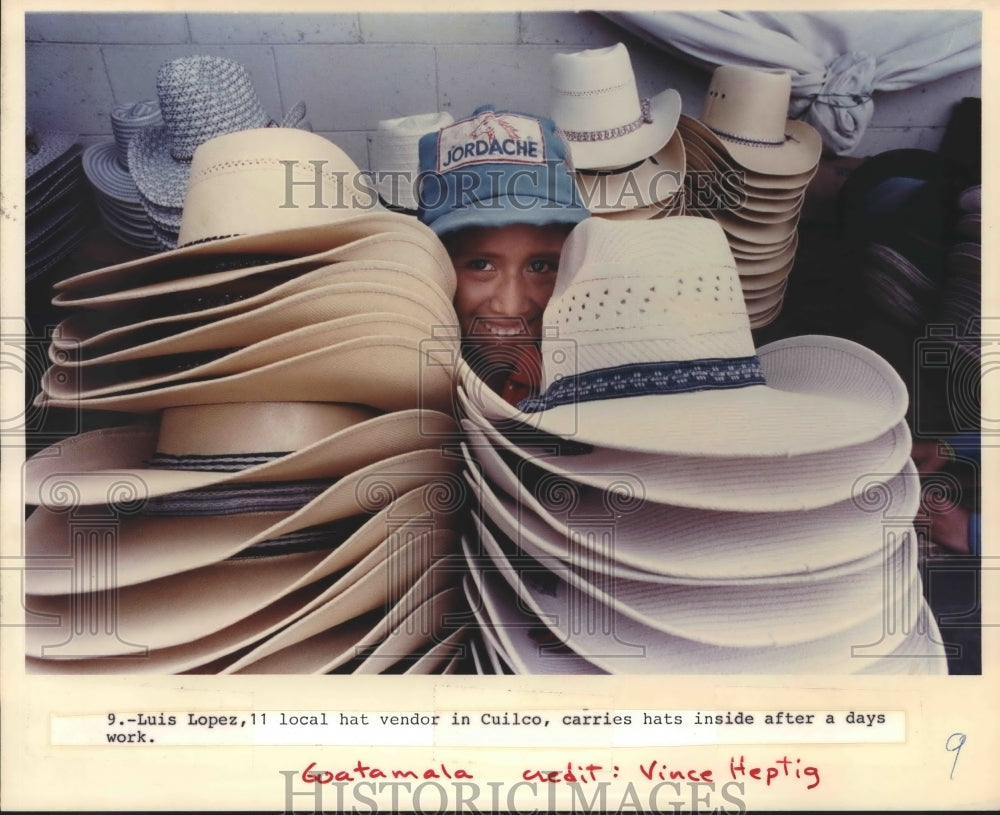 1990 Hat vendor, Luis Lopez in Cuilco, Guatemala - Historic Images