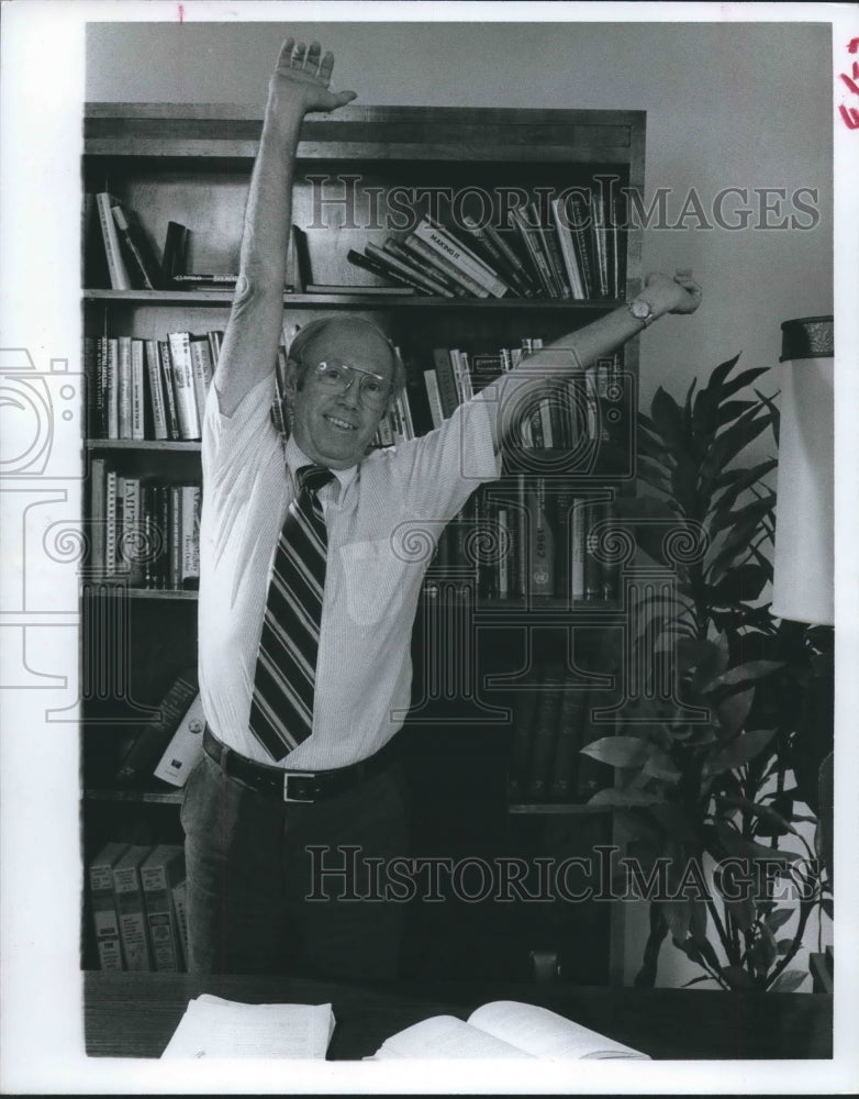 1978 Man demonstrates desk exercises - Historic Images