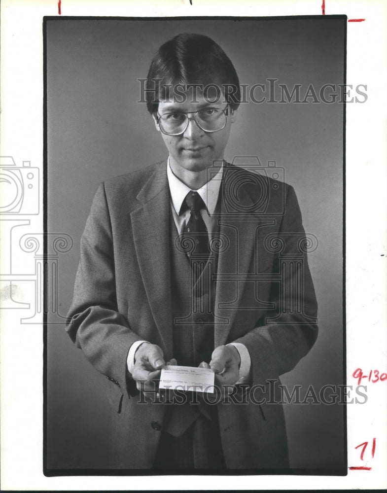 1985 How to present a business card in China is demonstrated - Historic Images