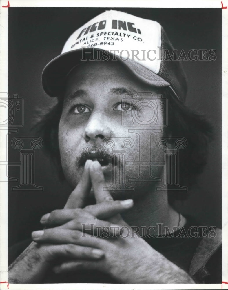 1983 Man wears Pico Incorporated hat - Historic Images