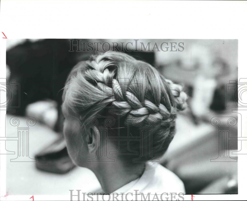 1988 Girl with braided chignon - Historic Images