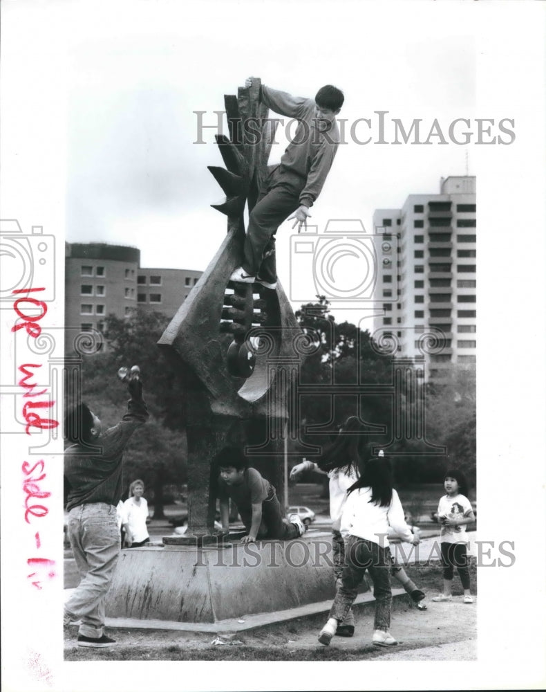 1993 Edward Chen Climbs &quot;Atropos Key&quot; Near Miller Outdoor Theater - Historic Images