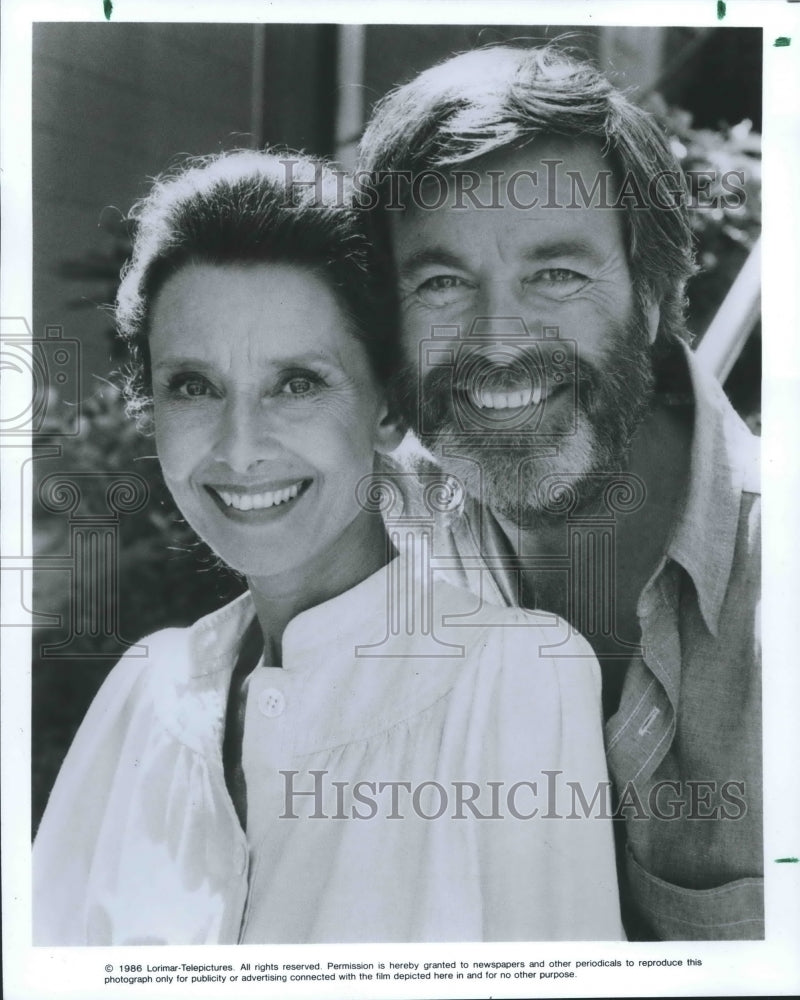 1987 Actress Audrey Hepburn and handsome man - Historic Images