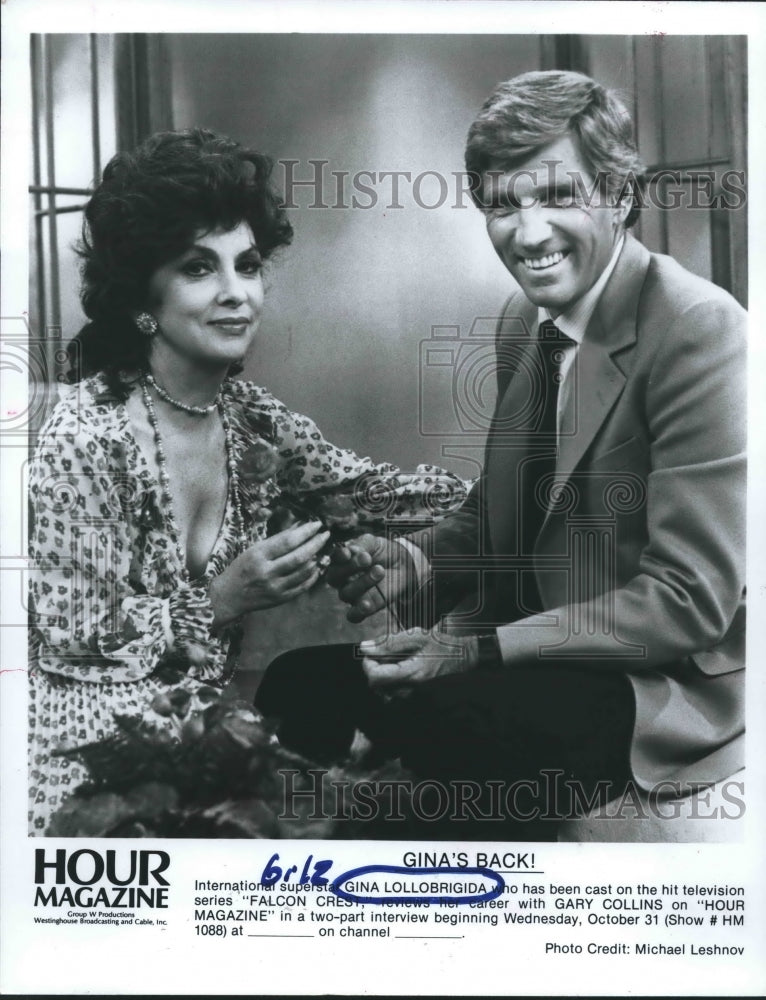 1986 Actress Gina Lollobrigida with Gary Collins on &quot;Hour Magazine&quot; - Historic Images