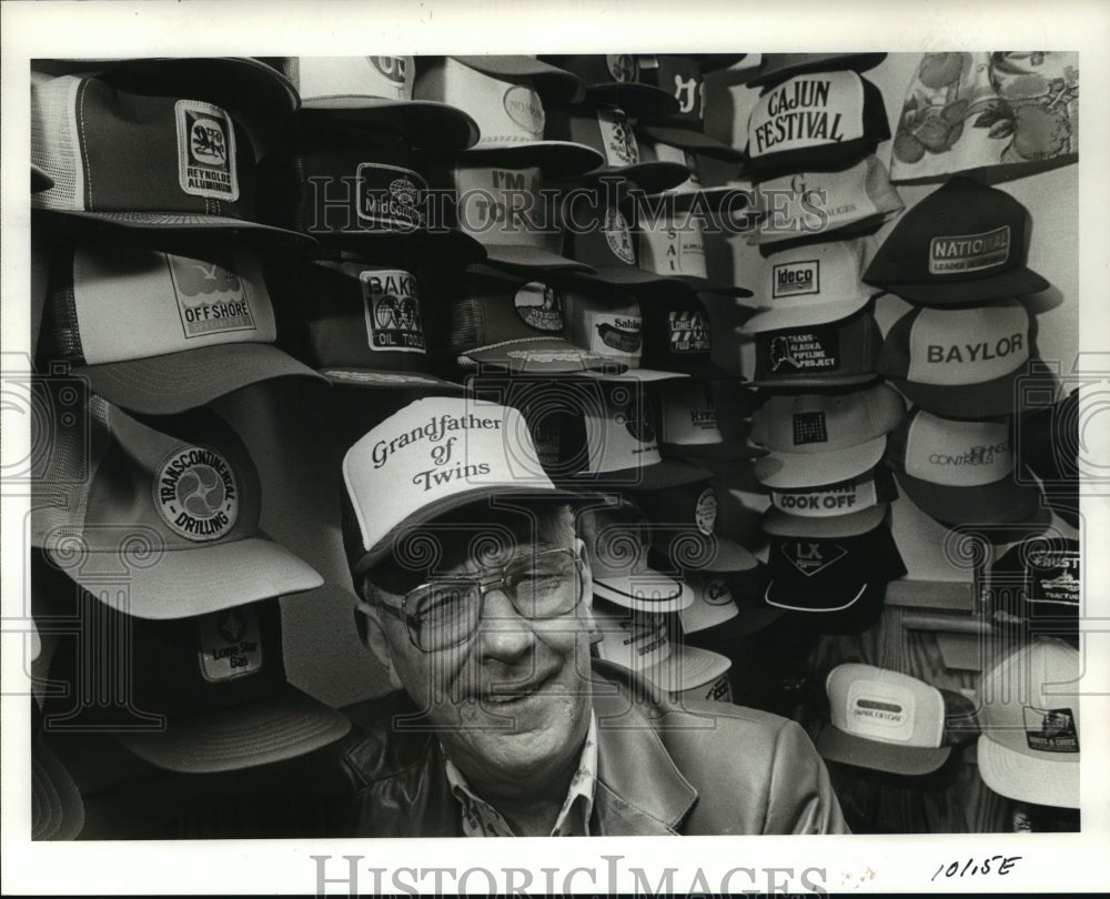 1985 Leon Singleton with his baseball hat collection in Houston - Historic Images