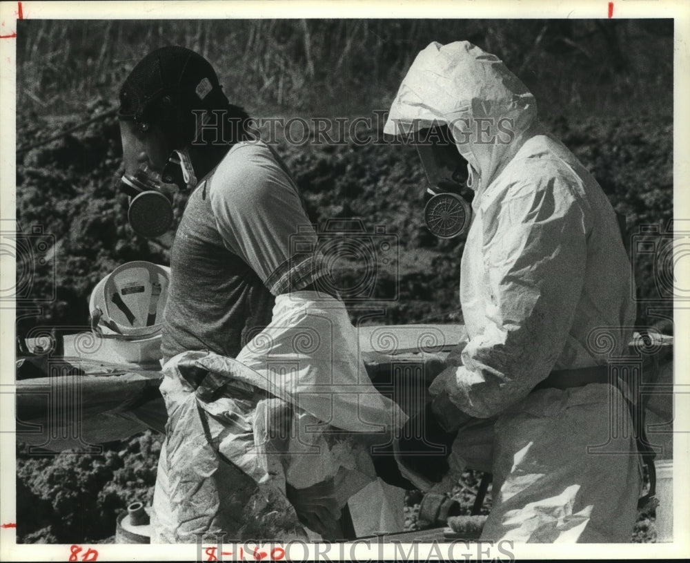 1984 Workers at Motco Hazardous Waste Site, Texas, Remove Gear - Historic Images