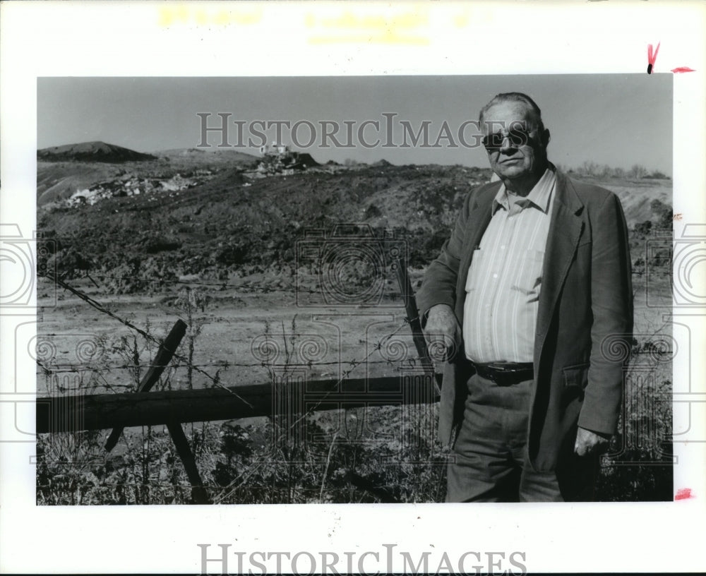 1991 Andy McCollum Stands at Landfill Near His Home in Arkansas - Historic Images