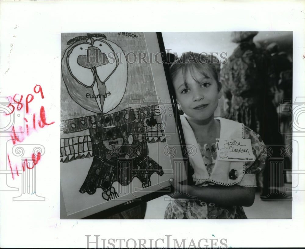 1992 Jessical Donelson with painting "Scare Crow" in Houston, TX - Historic Images