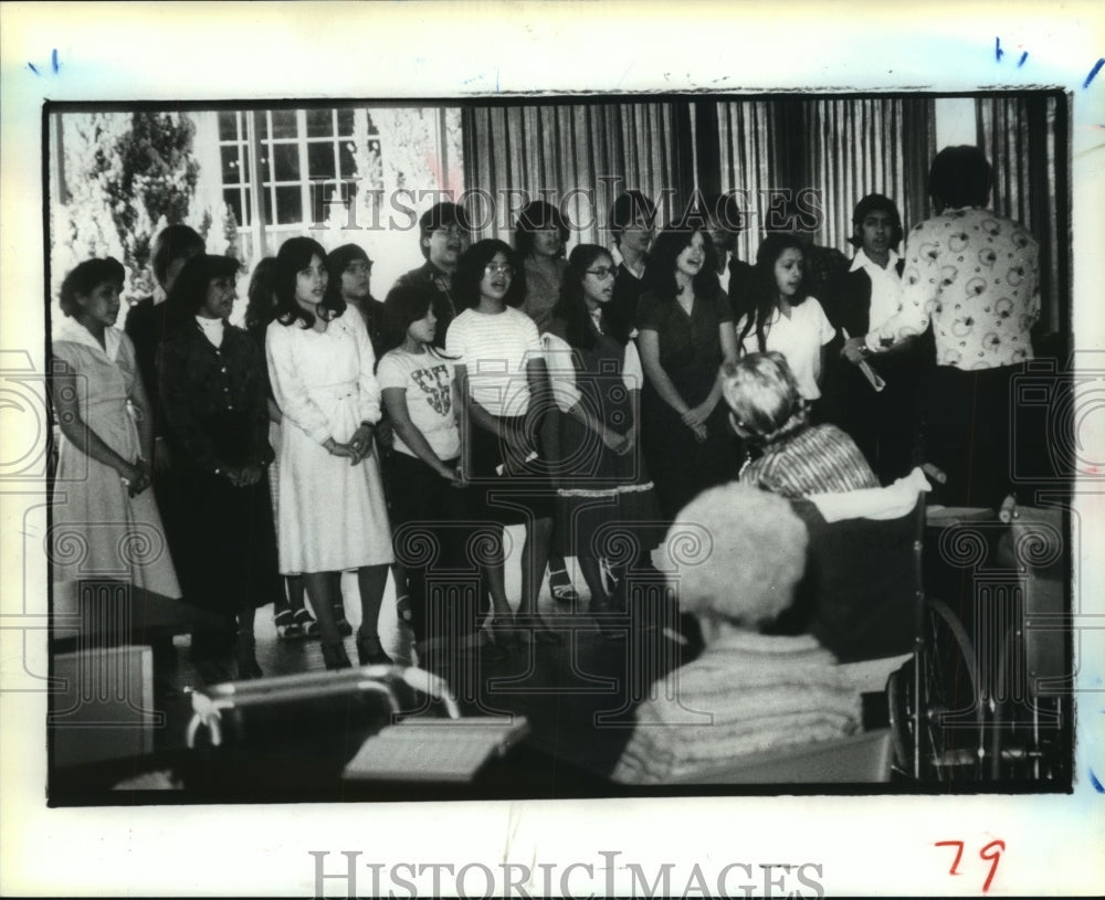 1980 Park Memorial Baptist youth group sing at Golden Age Manor, TX - Historic Images