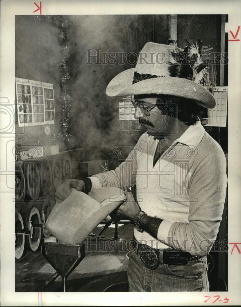 1979 Richard Wolf of Gary's wears Western hat with feathers in Texas - Historic Images