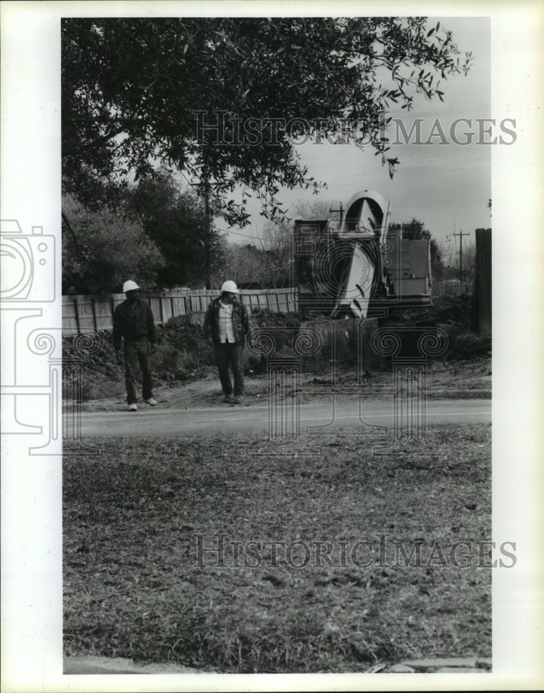 1988 Harris Co Flood Control District workers leave work site in TX - Historic Images