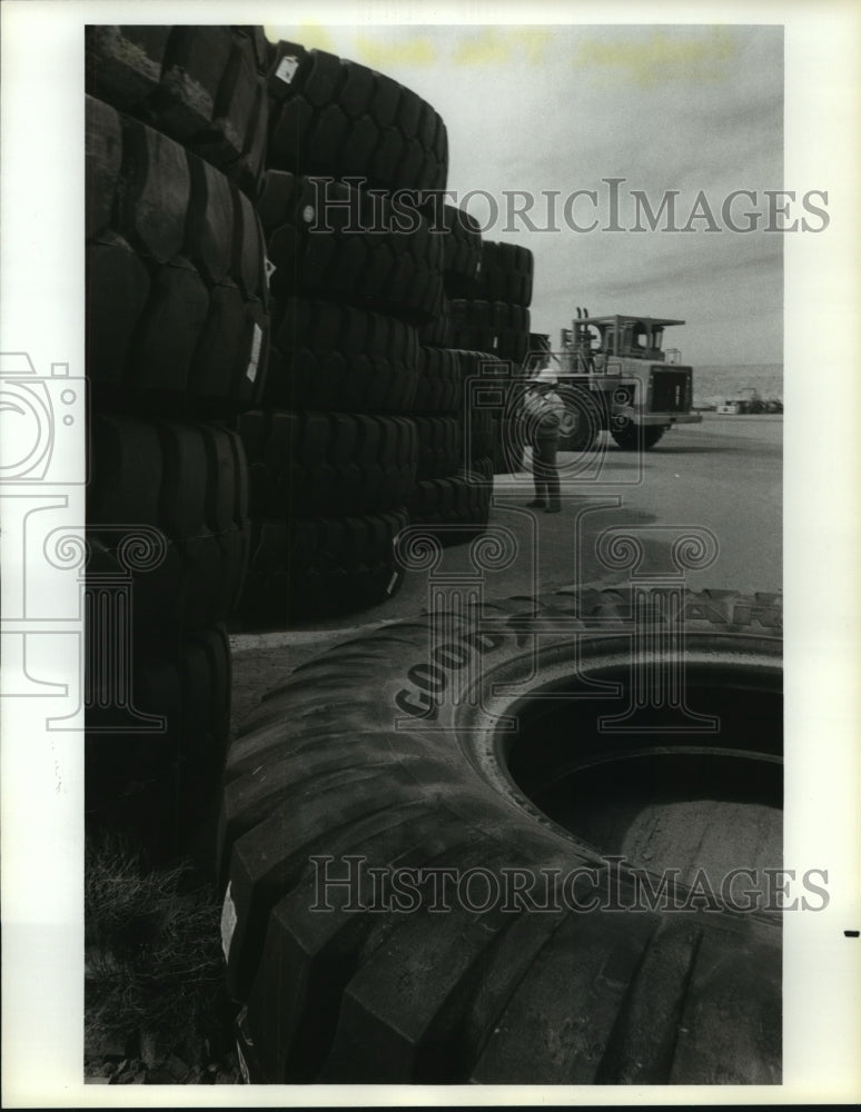 1989 Used Unisteel earthmover tires used by Monterey Construction Co - Historic Images