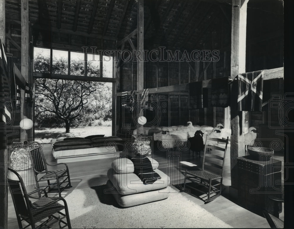 1977 Interior decorating of living room in converted bar - Historic Images