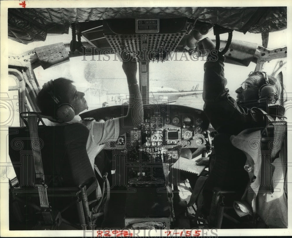 1981 Student &amp; teacher in cockpit of Houston Helicopters in TX - Historic Images