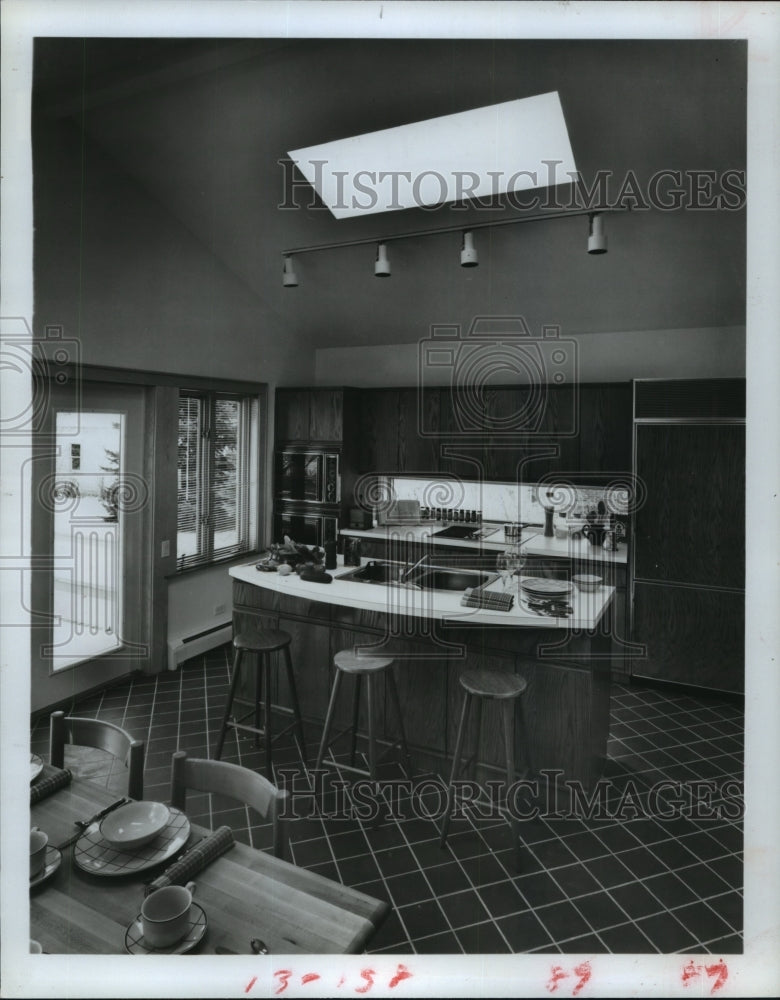 1981 Remodeled kitchen from above - Historic Images