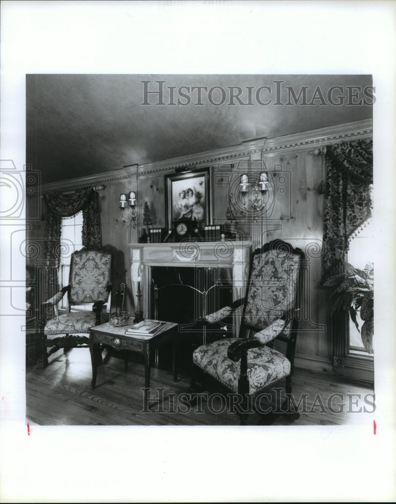 1991 American hall chairs next to fire place on Houston home tour - Historic Images
