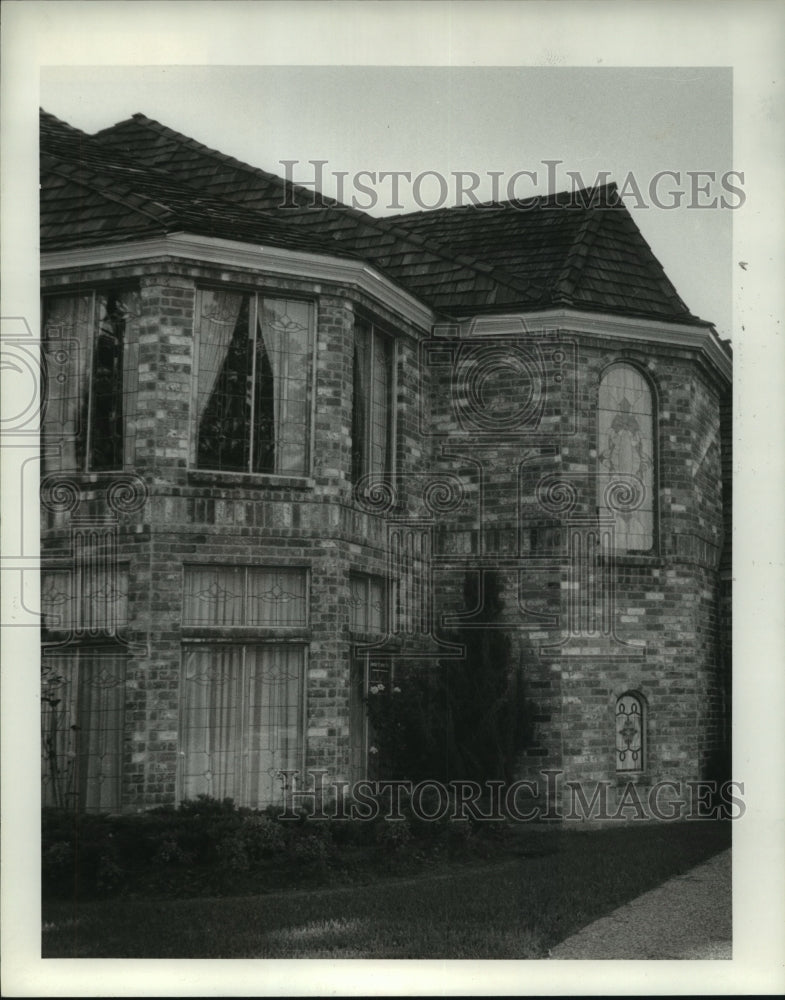 1984 Brick home exterior at Champions Forest subdivision in Houston - Historic Images