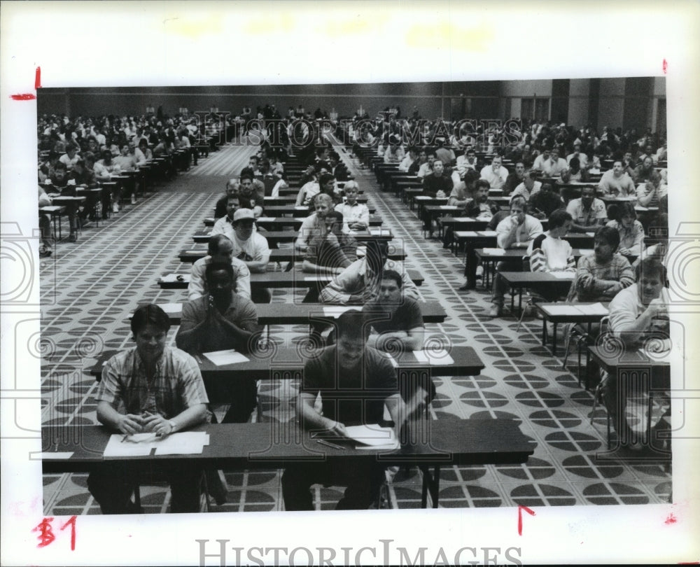 1990 Houston firefighters take test in hopes of driving the truck - Historic Images