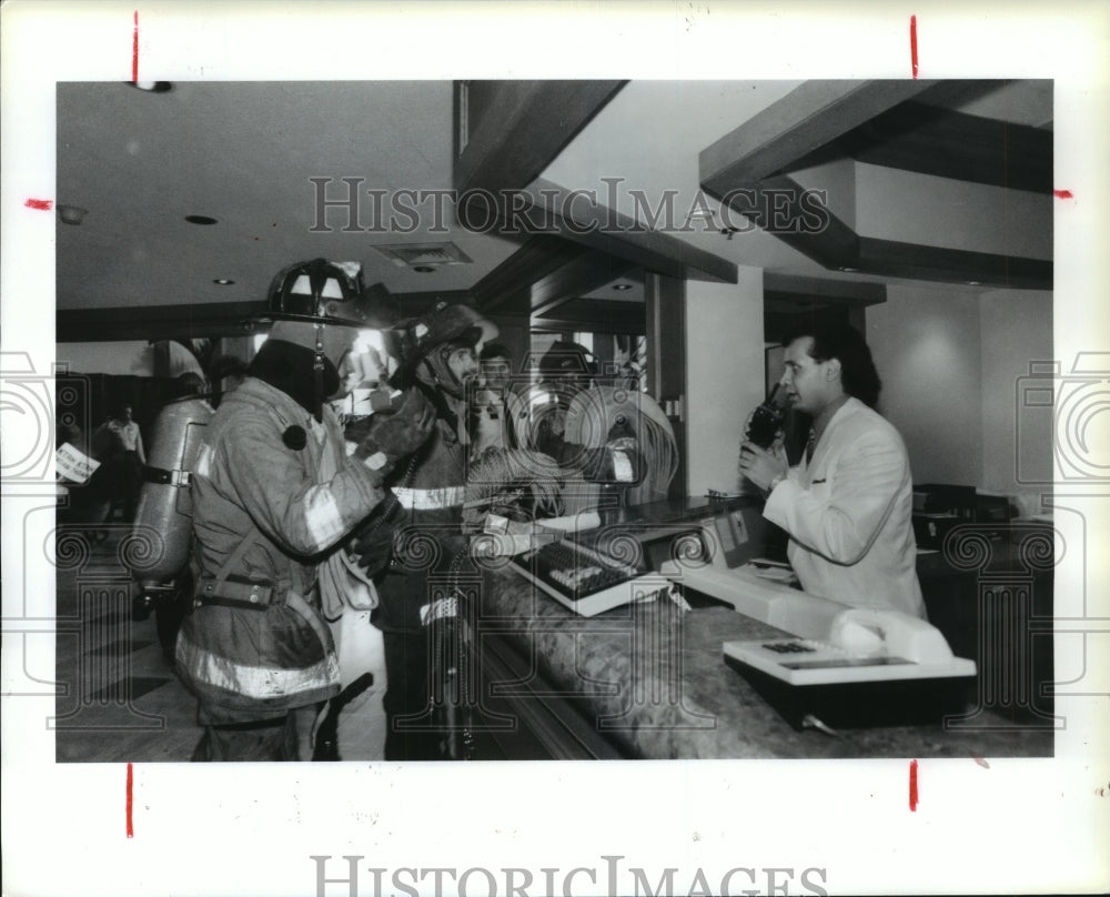 1989 Houston Firemen perform drill for Fire Prevention Week - Historic Images