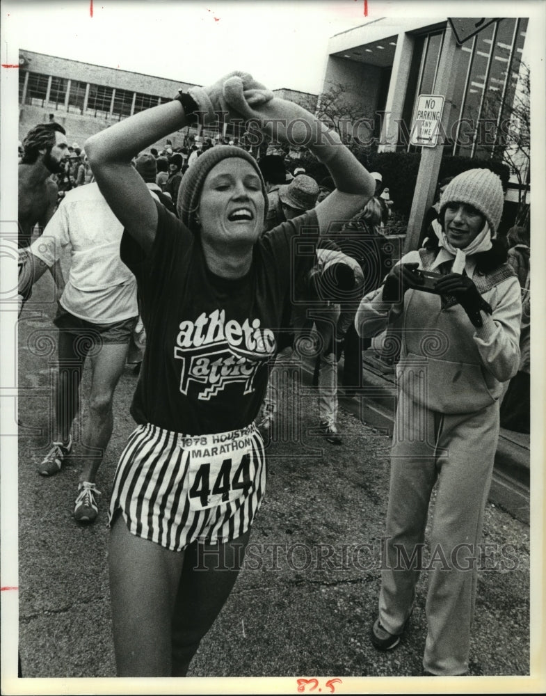 1978 Peggy Kokernot exhausted after Houston Marathon - Historic Images