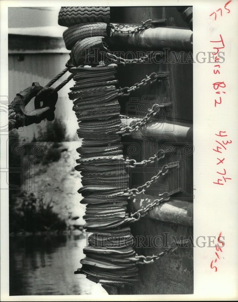 1980 Tires serve as bumper on Houston Ship Channel tug boat - Historic Images