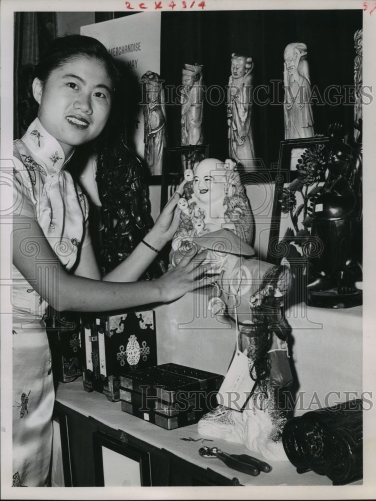 1960 Press Photo Eugenie Han at Polyasian booth at International Trade &amp; Travel - Historic Images