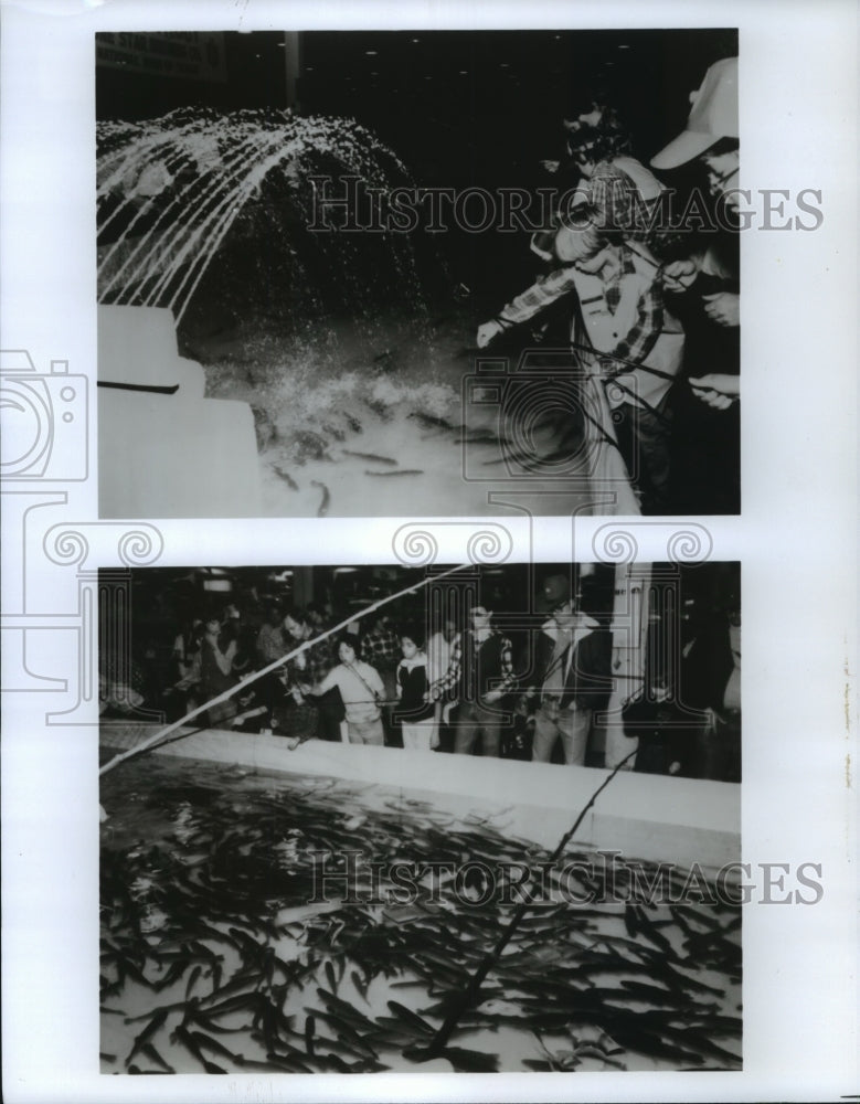 1989 People fish at Houston Boat, Sport, Travel Show - Historic Images