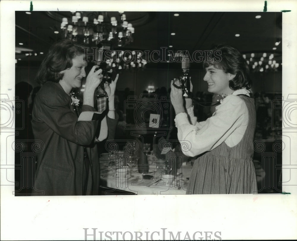1985 Ann Tally & Rosemary Wallace take photos, Duchesne Academy, TX - Historic Images