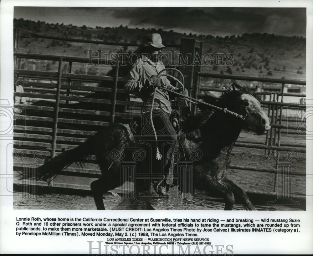 1988 California inmate Lonnie Roth rides horse inside prison corral - Historic Images