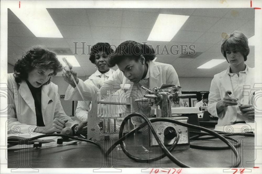 1982 Student Adria Singleton analyzes blood-Houston High Schools - Historic Images