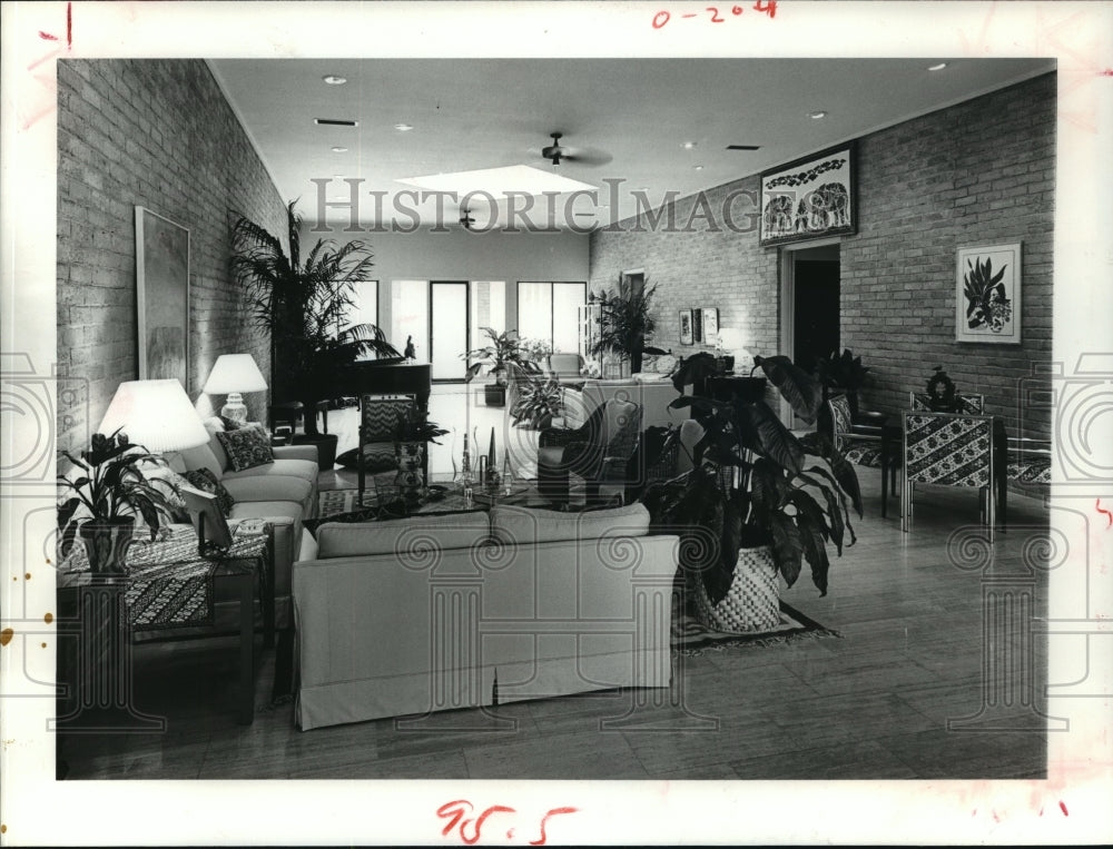 1979 Long center room includes furniture and piano in Houston home - Historic Images
