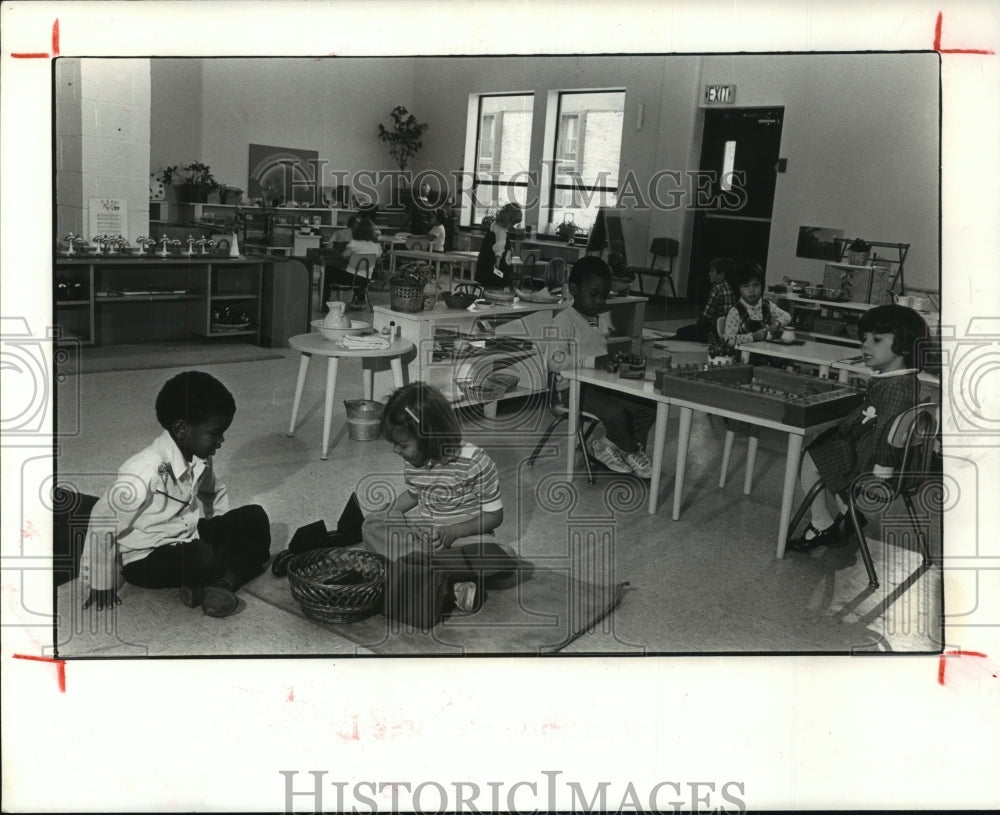 1983 Students play at St. Catherine's Montessori in Houston - Historic Images