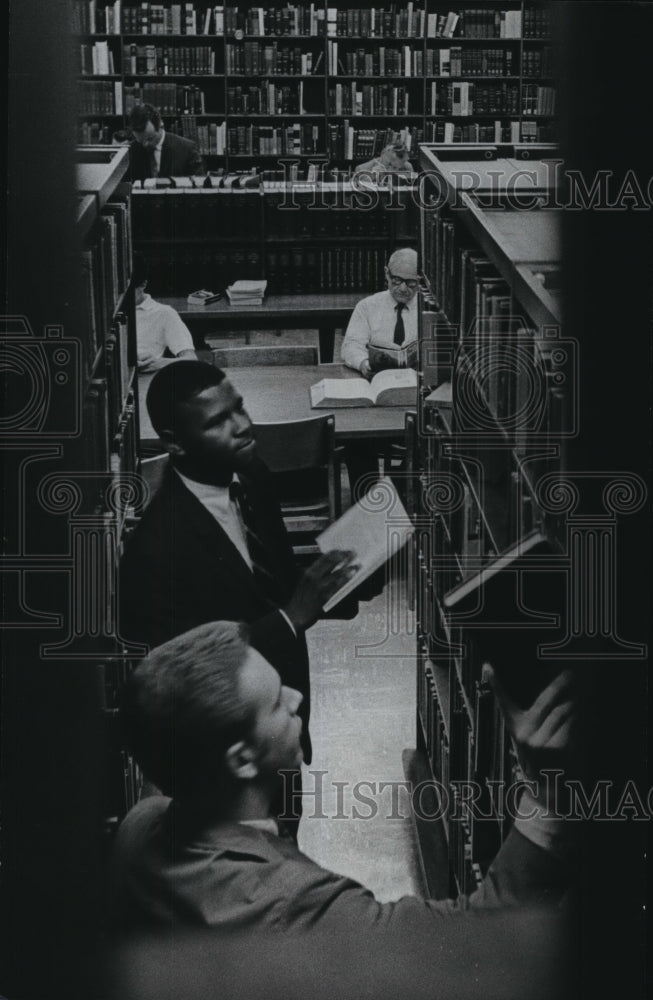 1968 Patrons search for books at Houston Central Public Library - Historic Images